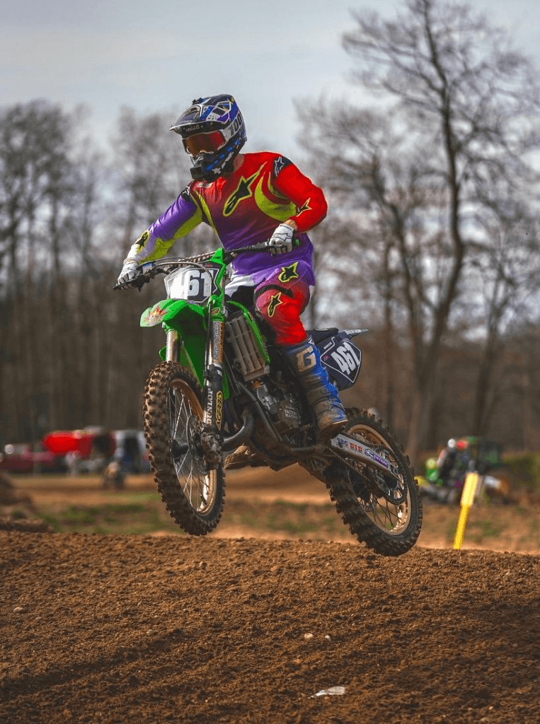 Rider on motocross bike during training